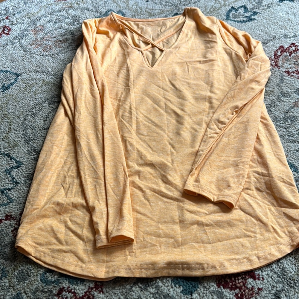 Never worn Yellowish orange long sleeve top size large